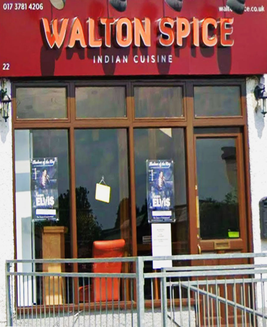 Walton Spice Indian restaurant storefront on Walton Street, Tadworth